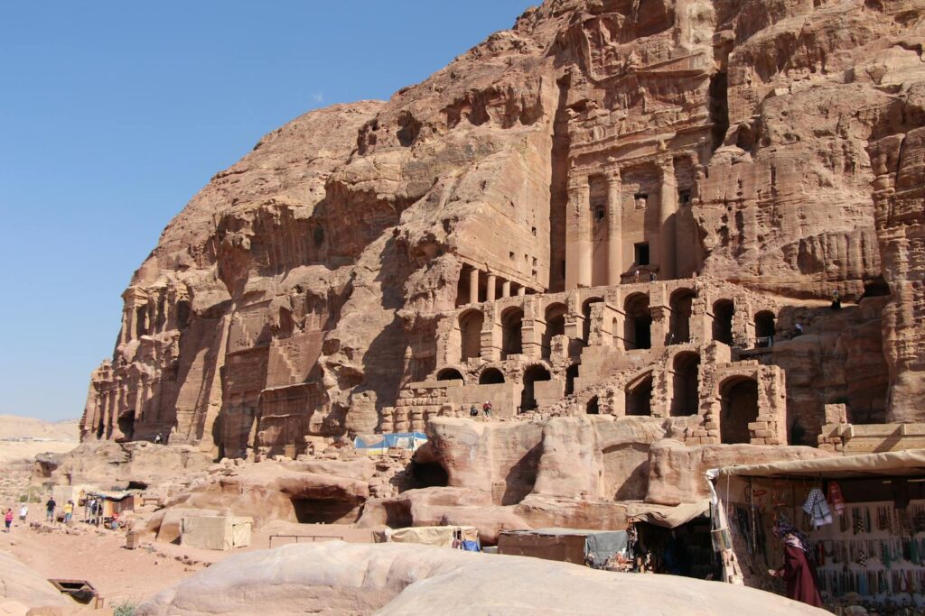 Petra Travel Guide: Discover the carved cliffs and ancient architecture of Petra, a UNESCO World Heritage Site in Jordan.