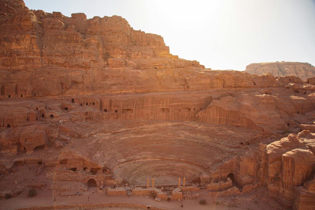 Petra Travel Guide: Stunning view of the Nabatean amphitheater carved into rock in Petra, Jordan.