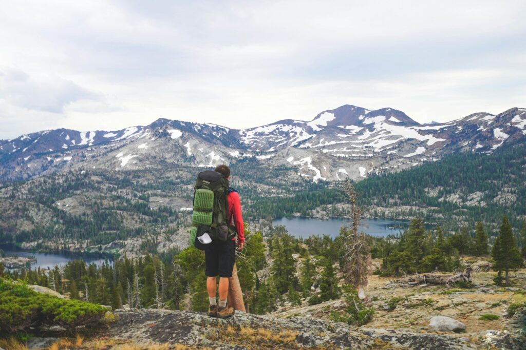 Patagonia Hiking Guide: person standing on mountain wearing backpack