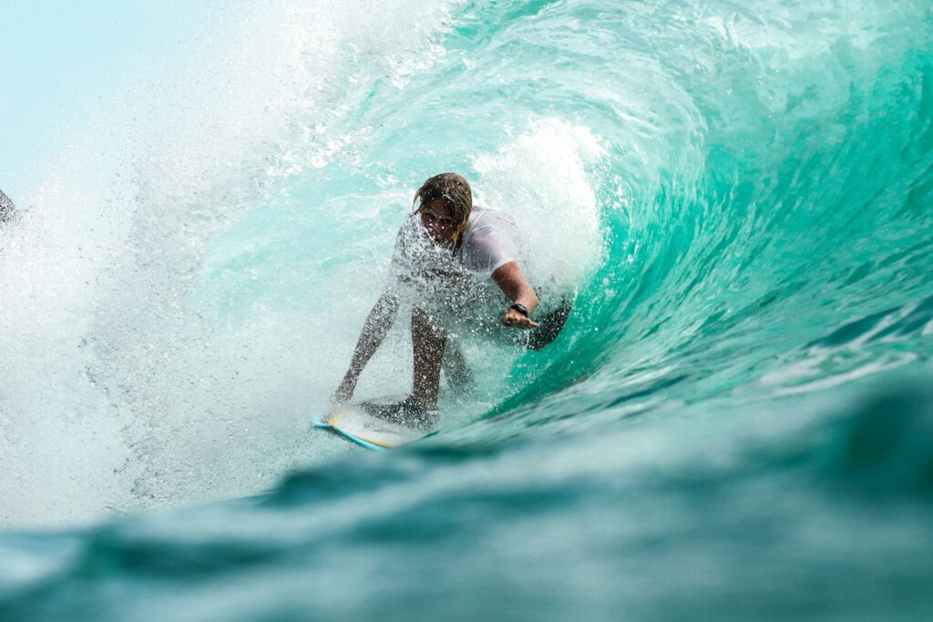 Best Beaches in Australia : time lapse photography surfer in wave water