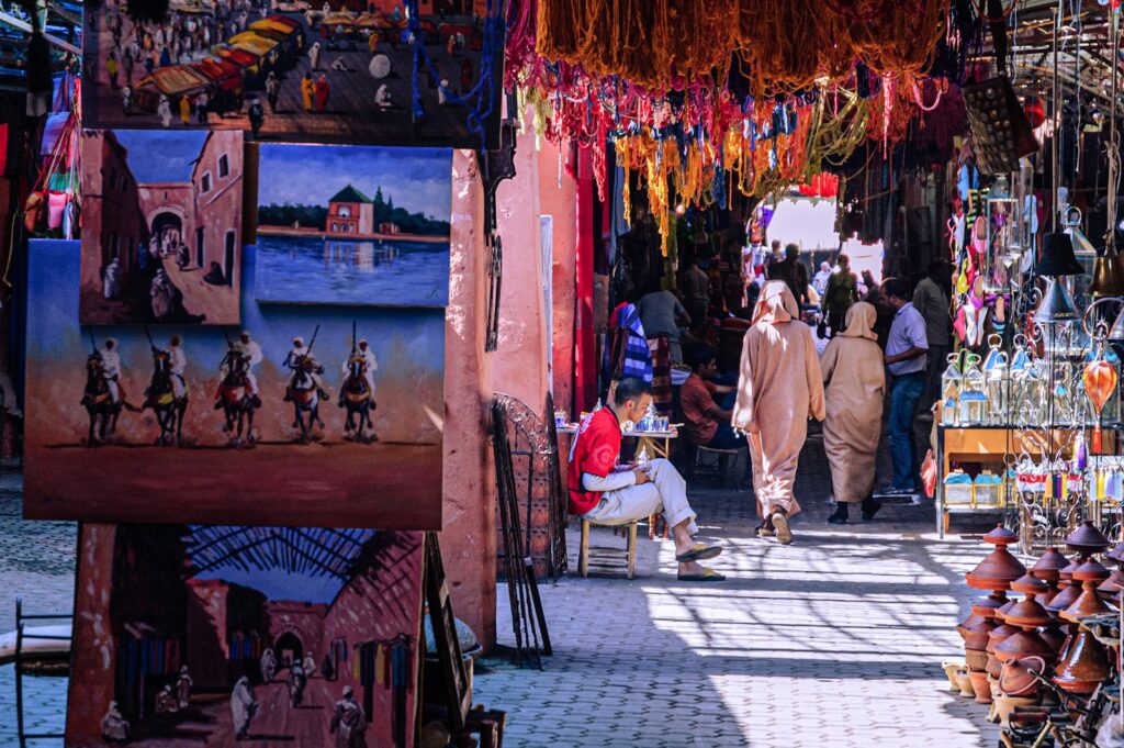 budget travel in Africa: people walking on street during daytime