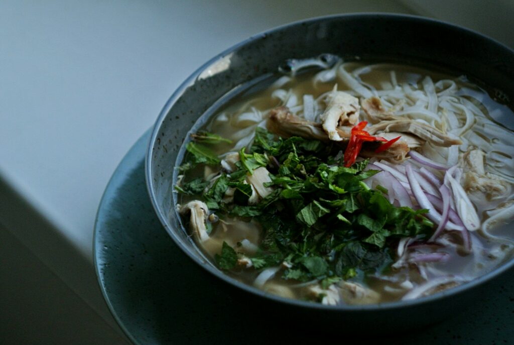 Australia and New Zealand Food Guide: pho, soup dish in white ceramic bowl