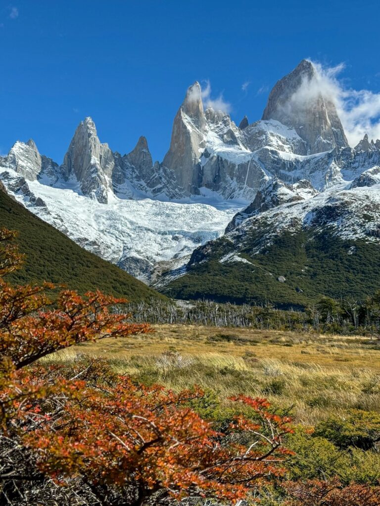 Patagonia Hiking Guide: a mountain range with snow covered mountains in the background