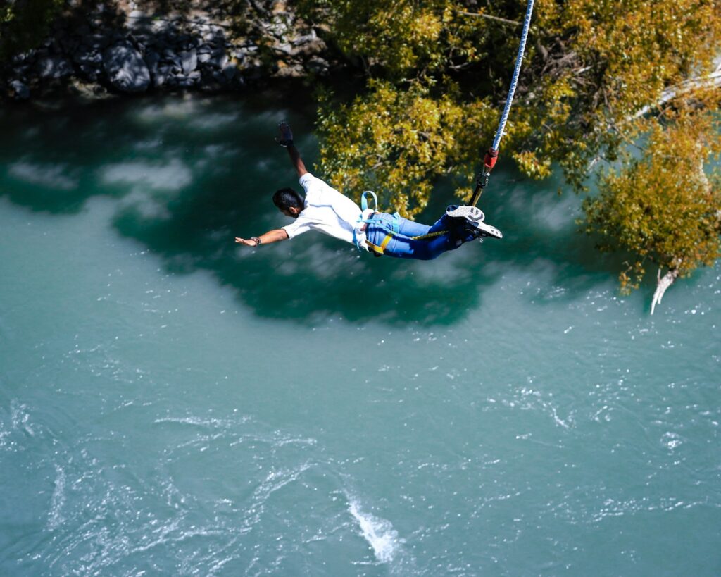 Travel Insurance Guide: man bungee jumping