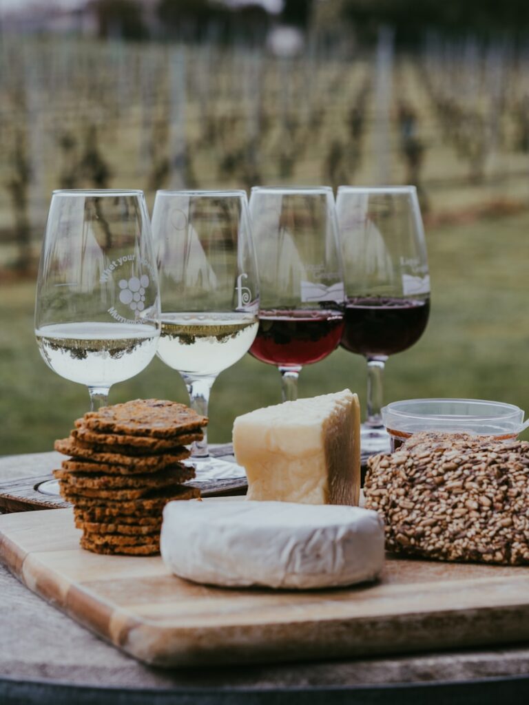 Australia and New Zealand Food Guide: clear wine glass with red wine on table