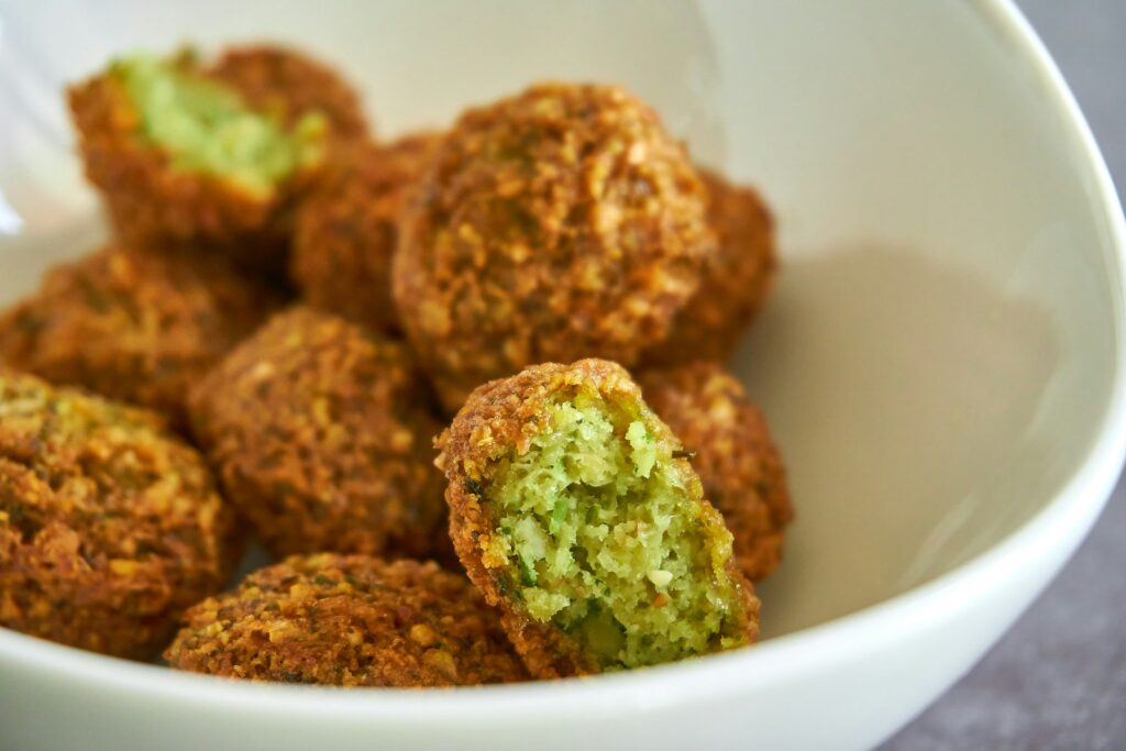 Authentic Middle Eastern Cuisine: fried food on white ceramic bowl