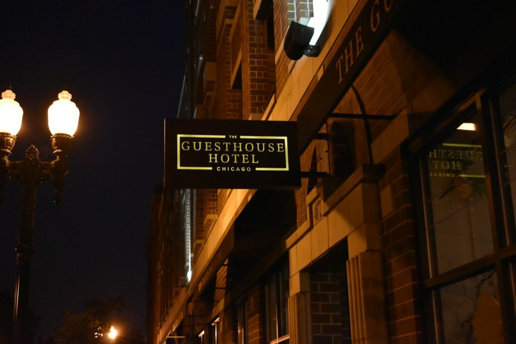 Solo Travel Safety Tips: turned on Guesthouse Hotel Chicago LED signage